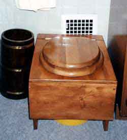 $25 hinged-top compost toilet.